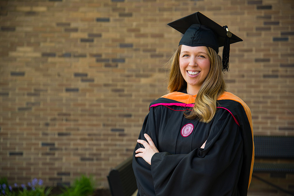 Happy female B.S.N. graduate.