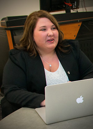 Rachel Rose working at her computer.