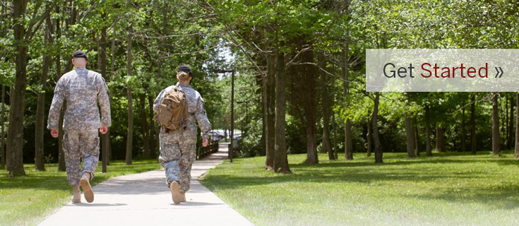 Military / Veteran Students walking on IU East Campus with caption, Get Started'